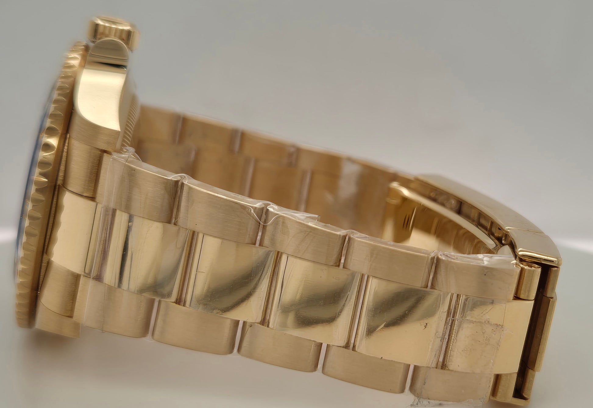 Rolex Submariner Date “Bluesy” 18ct Yellow Gold 126618LB side left