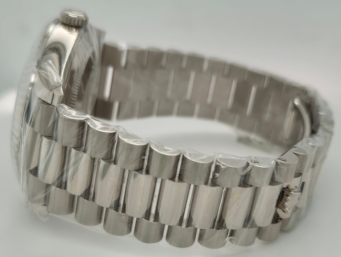 Rolex Day-Date 40 Olive Green Roman Dial White Gold 228239 side left