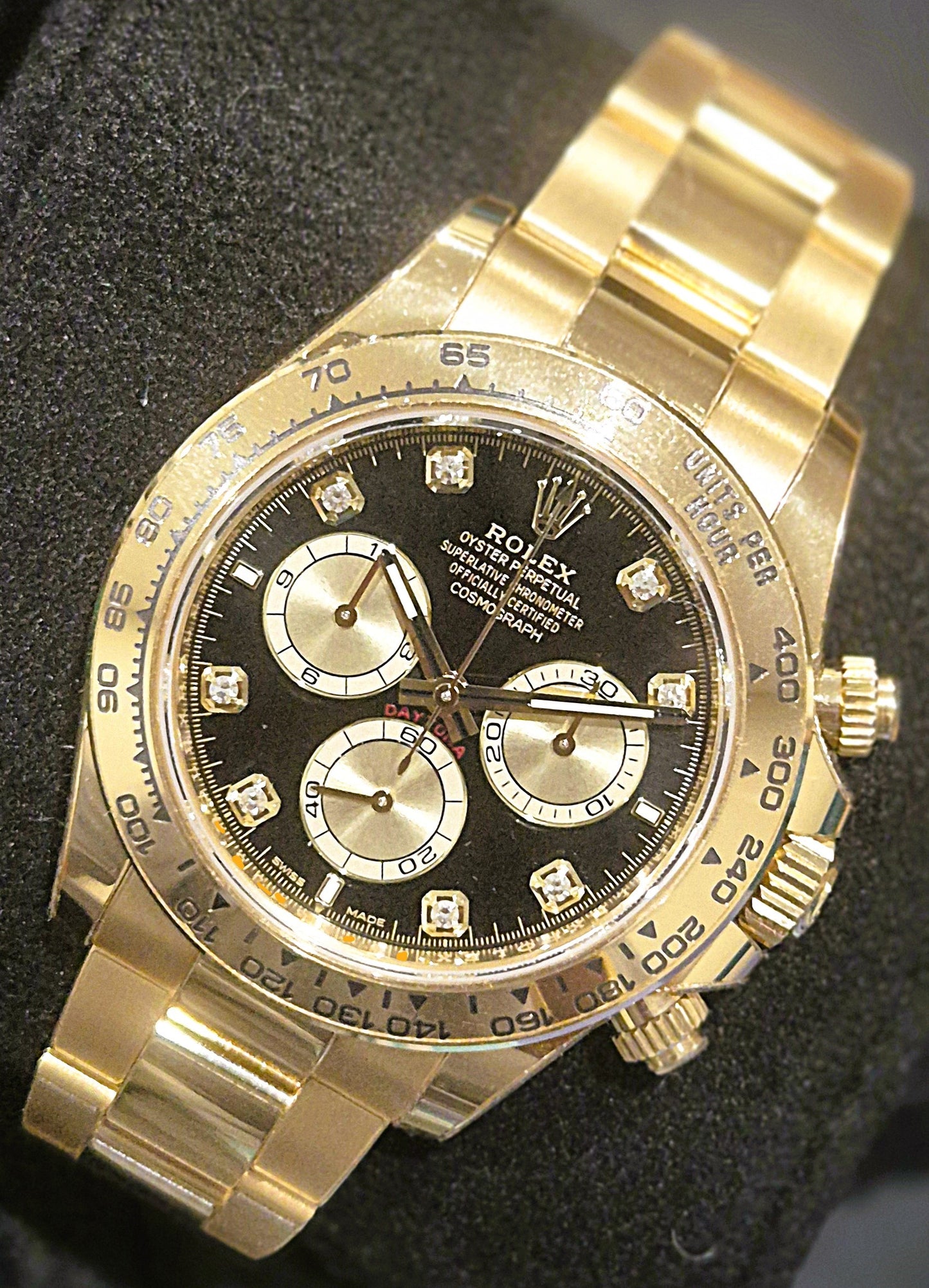 Rolex Cosmograph Daytona Yellow Gold Black Diamond Dial 126508 front right