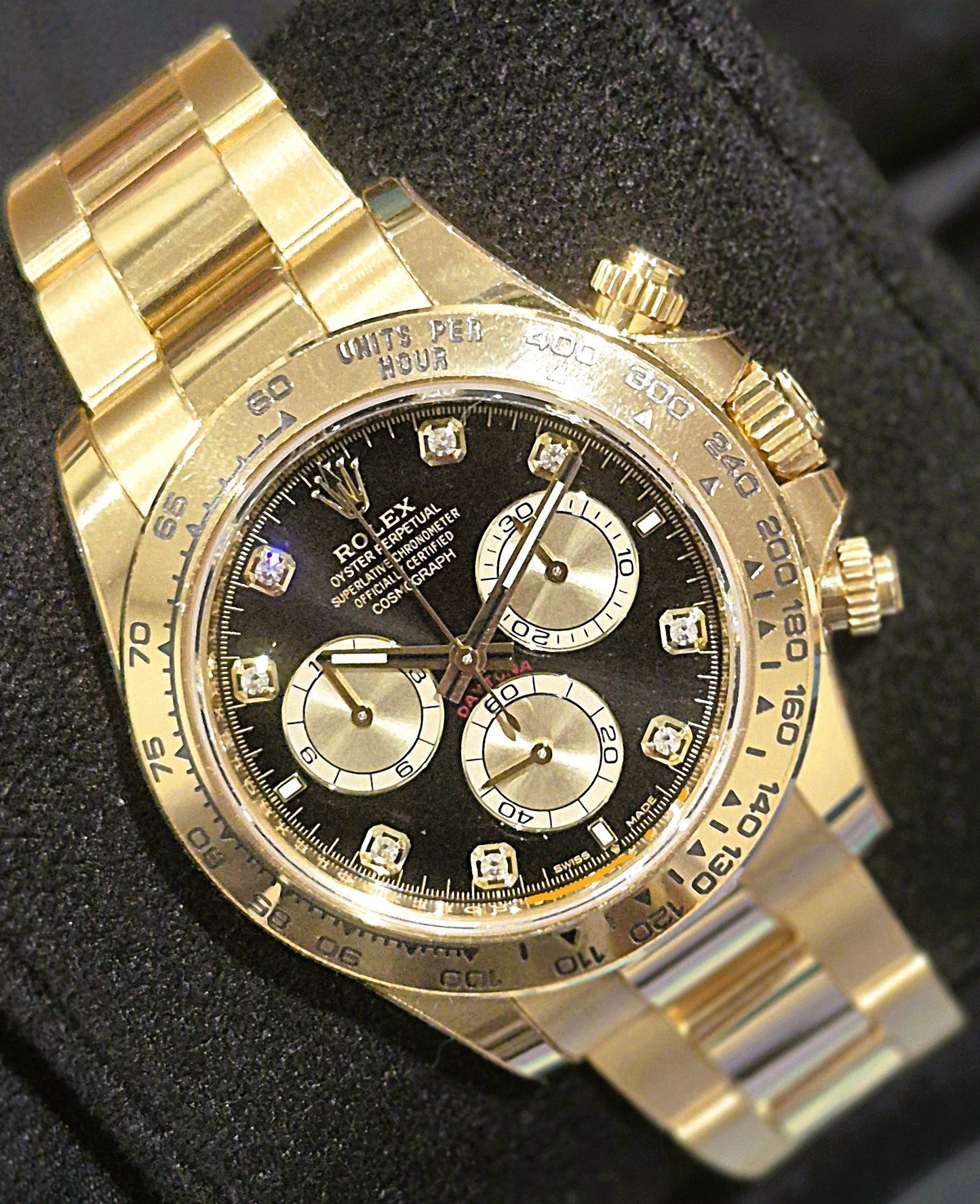 Rolex Cosmograph Daytona Yellow Gold Black Diamond Dial 126508 front left