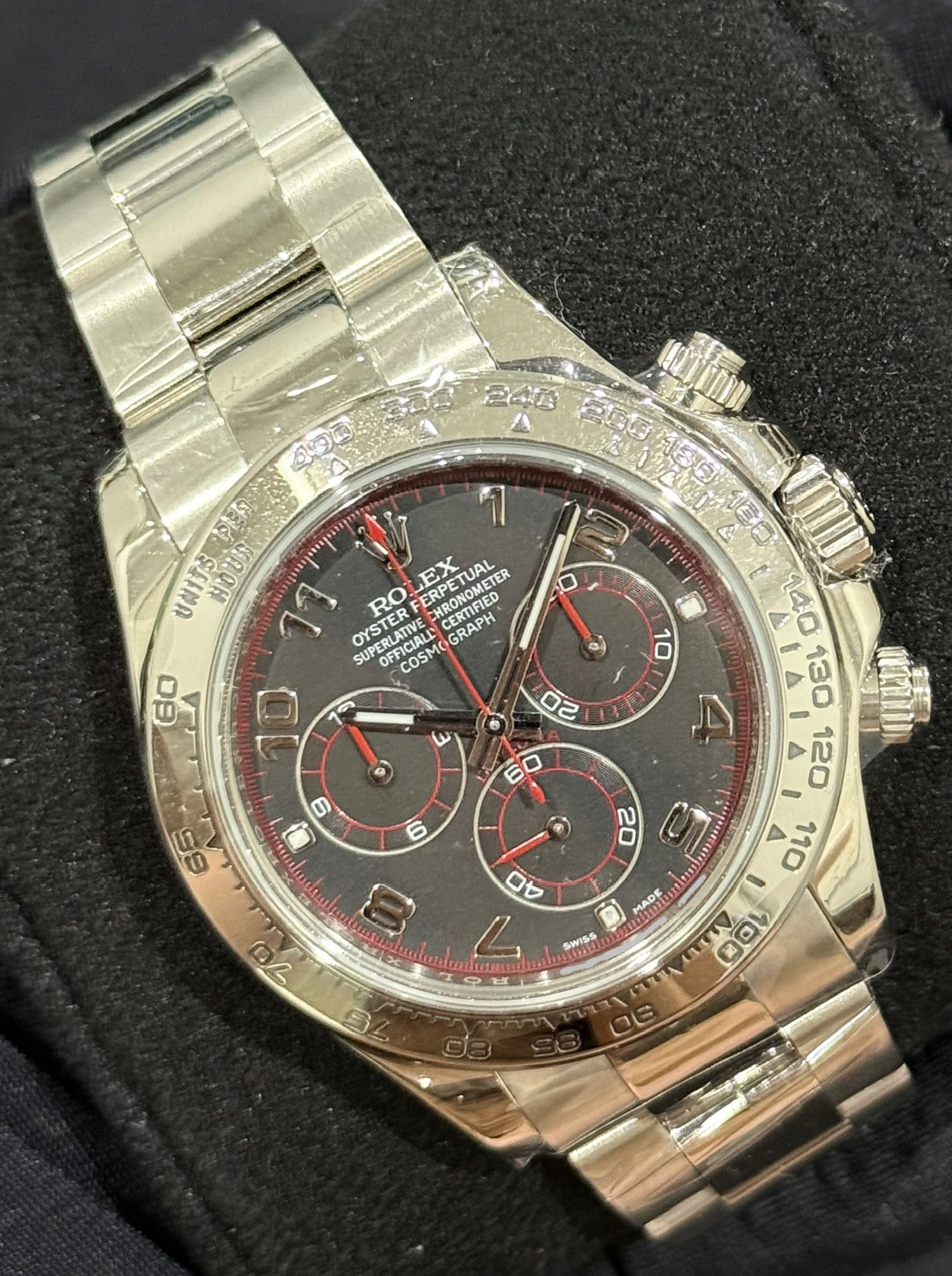 Rolex Daytona Cosmograph Black/Red Racing Arabic Dial White Gold 116509 front left
