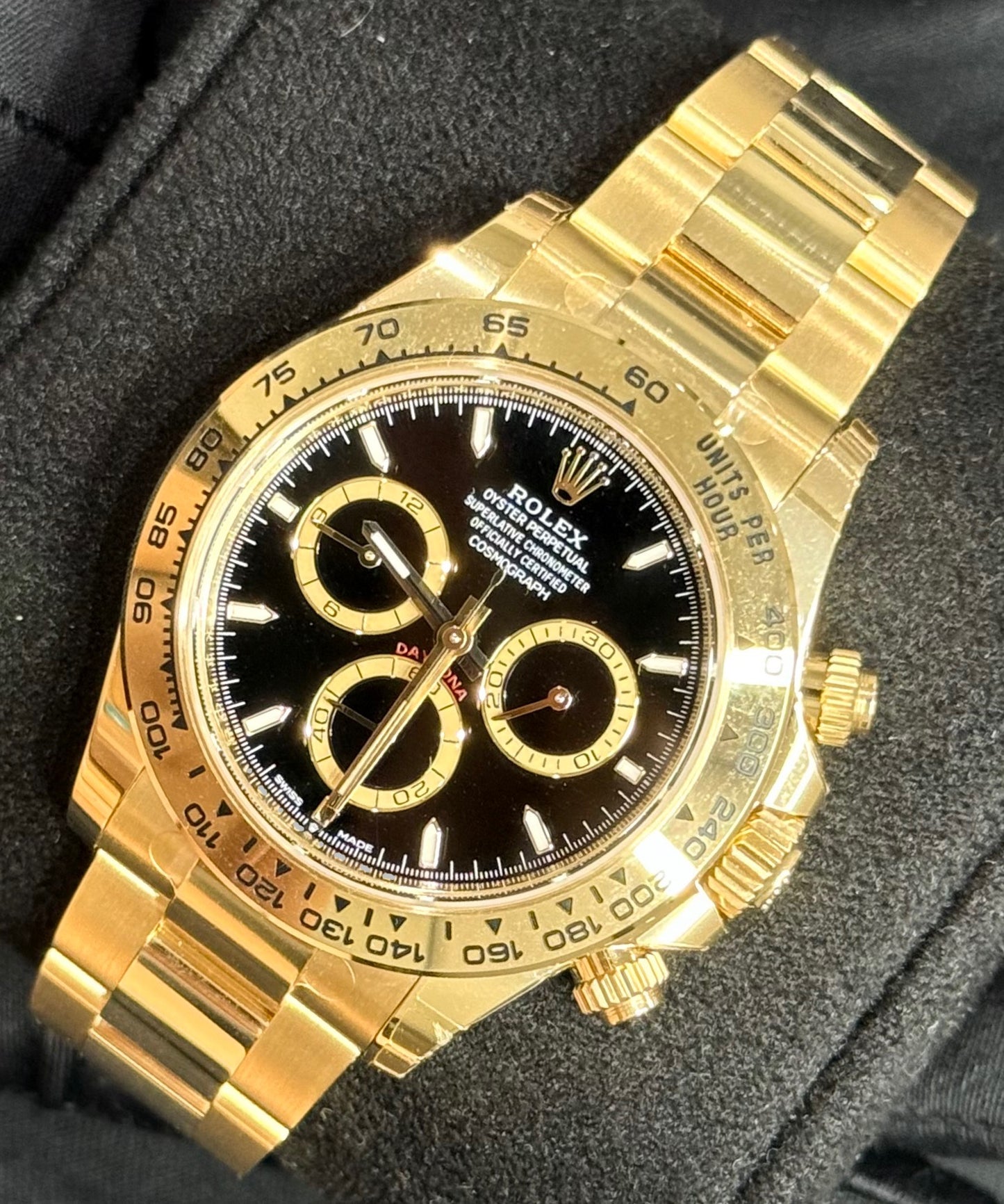 Rolex Cosmograph Daytona Yellow Gold Black Dial with Gold Rings 126508 front right