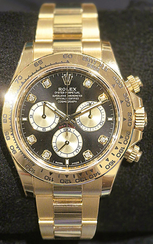 Rolex Cosmograph Daytona Yellow Gold Black Diamond Dial 126508 front