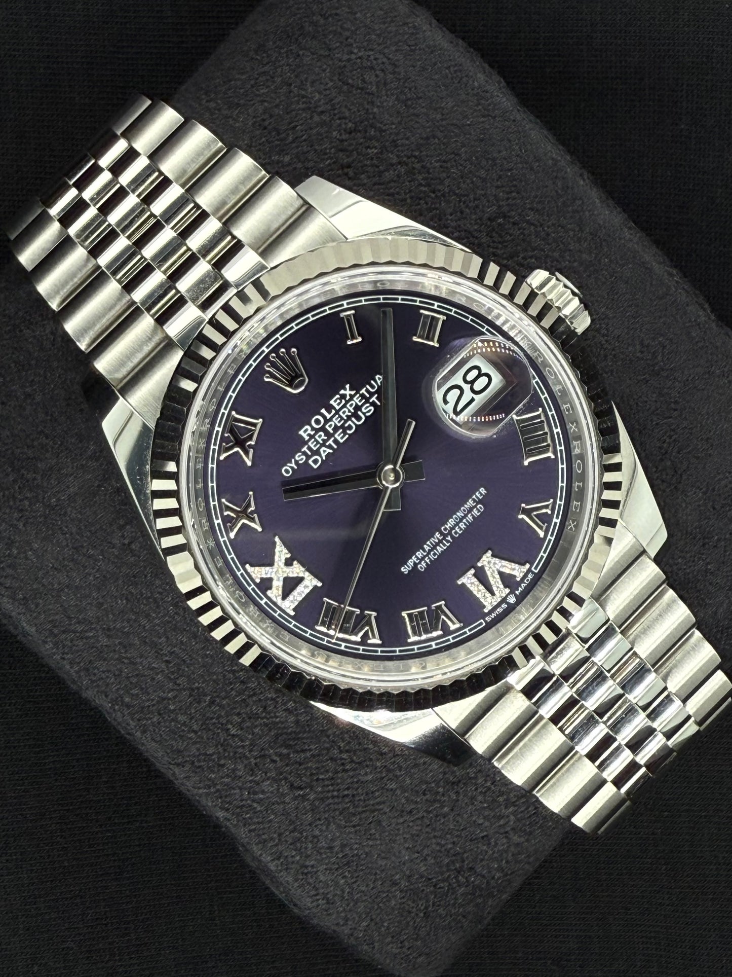 Rolex Datejust 36 Fluted Bezel Stainless Steel Purple Diamond Set Roman Dial VI and IX Jubilee 126234 left