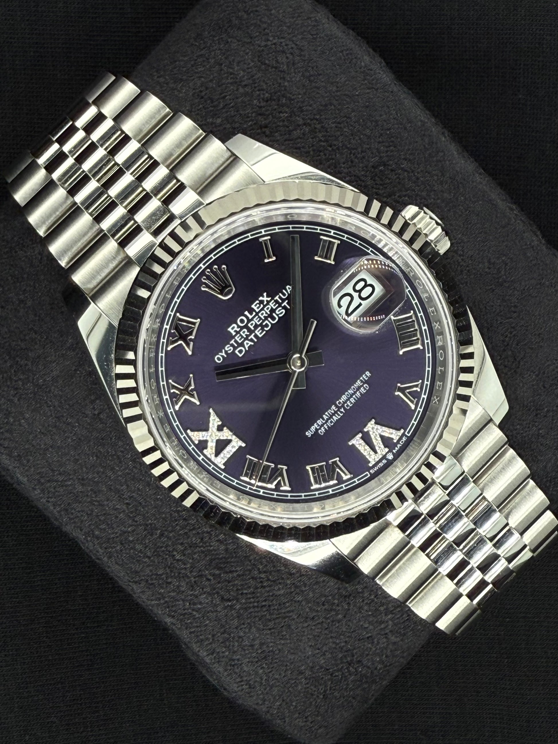 Rolex Datejust 36 Fluted Bezel Stainless Steel Purple Diamond Set Roman Dial VI and IX Jubilee 126234 left