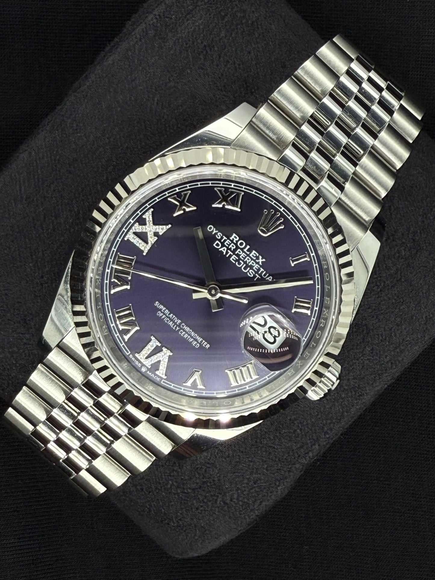 Rolex Datejust 36 Fluted Bezel Stainless Steel Purple Diamond Set Roman Dial VI and IX Jubilee 126234 right