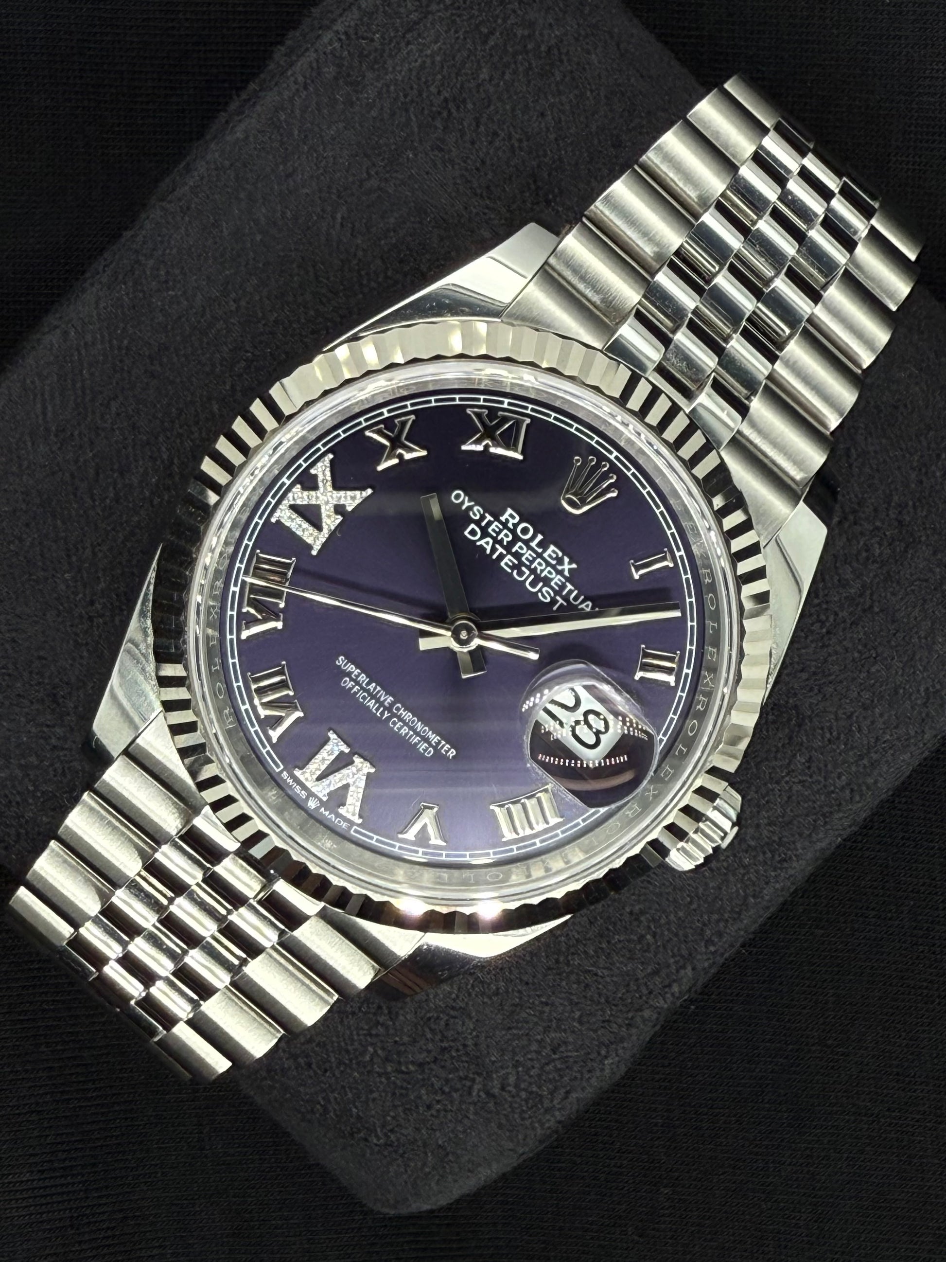 Rolex Datejust 36 Fluted Bezel Stainless Steel Purple Diamond Set Roman Dial VI and IX Jubilee 126234 right