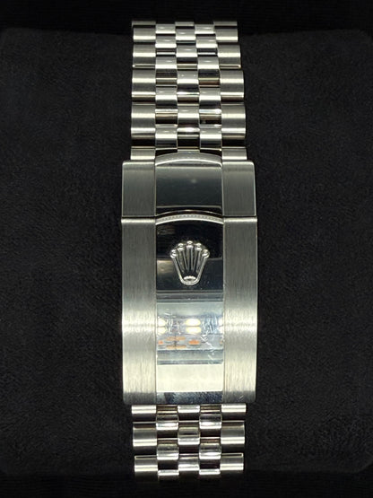 Rolex Datejust 36 Fluted Bezel Stainless Steel Purple Diamond Set Roman Dial VI and IX Jubilee 126234 clasp