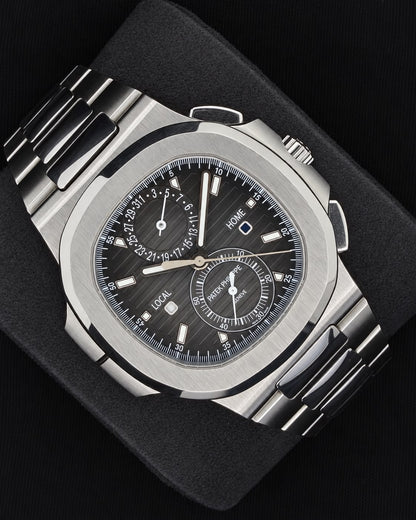 Patek Philippe Nautilus Travel Time Chronograph Black Noir Trame Dial Stainless Steel 5990/1A-001 | 2021 | 40.5mm